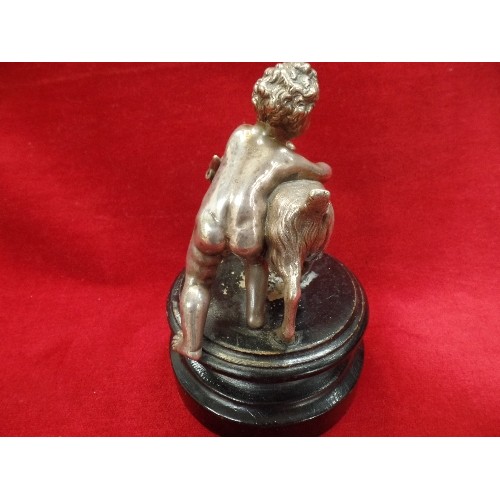 72 - A 19TH CENTURY SILVER PLATED FIGURE OF A CHERUB WRESTLING A GOAT IN THE CLASSICAL STYLE - ON AN EBON... 