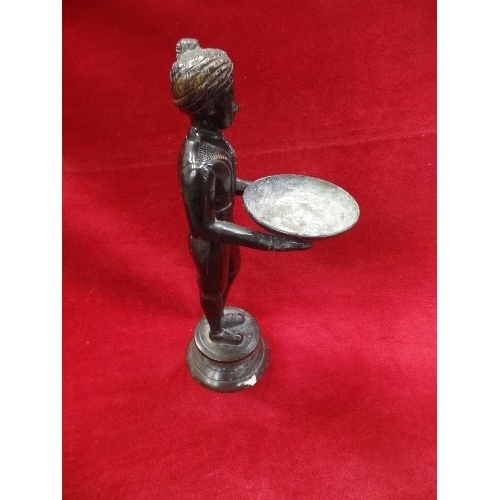 73 - A PATINATED BRONZE FIGURE OF A BLACKAMOOR CARRYING A BOWL - 28CM