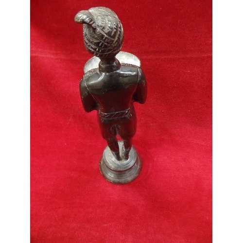 73 - A PATINATED BRONZE FIGURE OF A BLACKAMOOR CARRYING A BOWL - 28CM