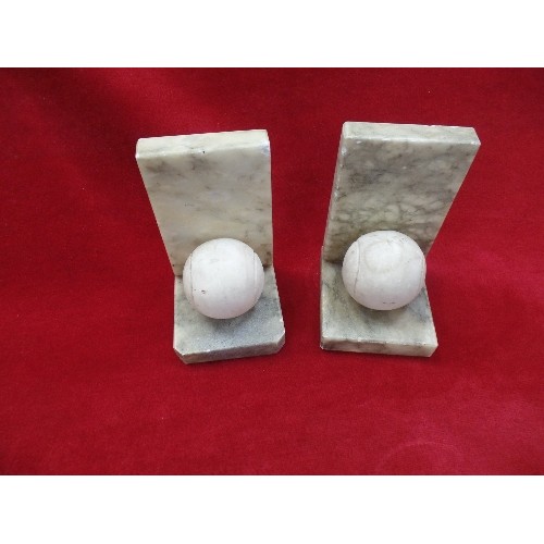 75 - A PAIR OF 20TH CENTURY ITALIAN CARVED ALABASTER TENNIS BALL BOOKENDS