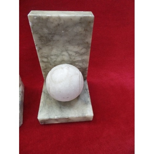 75 - A PAIR OF 20TH CENTURY ITALIAN CARVED ALABASTER TENNIS BALL BOOKENDS