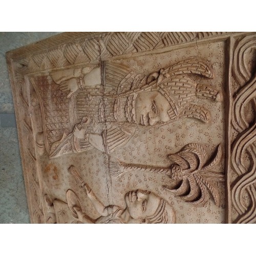 90 - A SECOND HALF 20TH CENTURY LARGE CARVED PANEL WITH  KINGS (OR GODS) WITH SUBJECTS - PROBABLY SOUTH P... 