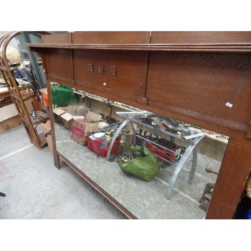 111 - VERY LARGE OAK FRAMED MIRROR WITH SHELF ABOVE AND WITH ARTS & CRAFTS DETAIL. 189CM X 152CM