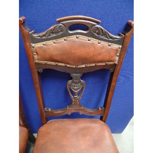 117 - FOUR EDWARDIAN DINING CHAIRS WITH UPHOLSTERED SEATS AND BACK RAILS