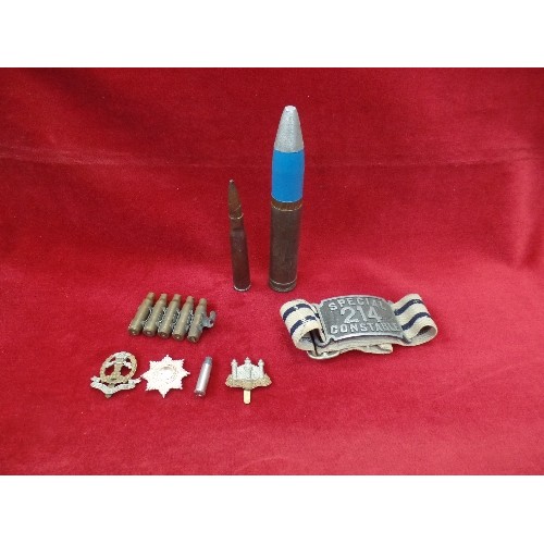 179 - MILITARIA LOT INCLUDING SHELL AND CARTRIDGE CASINGS, CAMBRIDGESHIRE REGIMENT CAP BADGE, MIDDLESEX RE... 