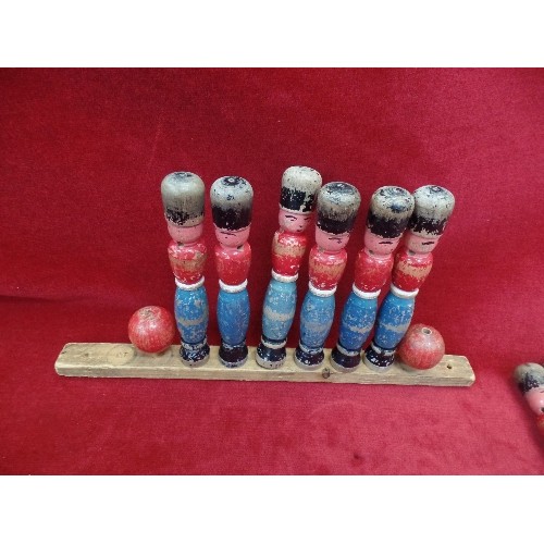 233 - 9 VINTAGE WOODEN SOLDIER SKITTLES WITH BALLS AND STAND