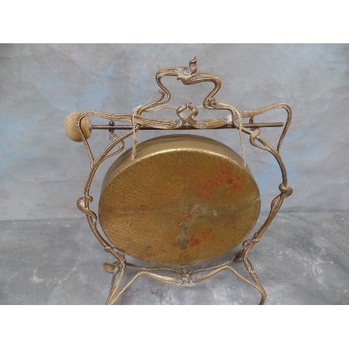 220 - EDWARDIAN DINNER GONG IN AN ORNATE ART NOUVEAU STYLE FRAME - WITH ORIGINAL STRIKER - 45CM H