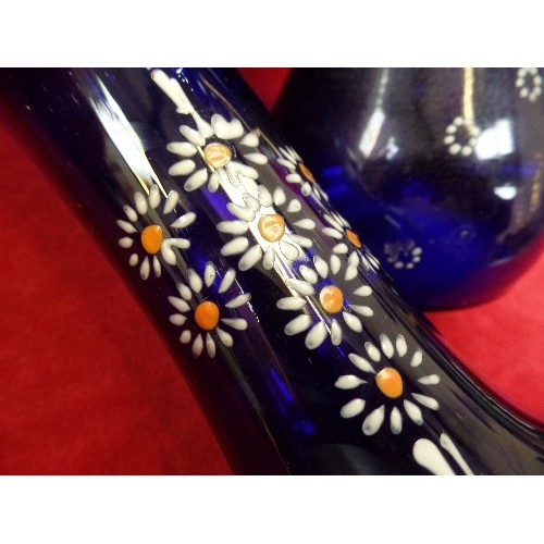 192 - THREE COBALT BLUE GLASS VASES WITH ENAMELLED FLOWER PATTERN