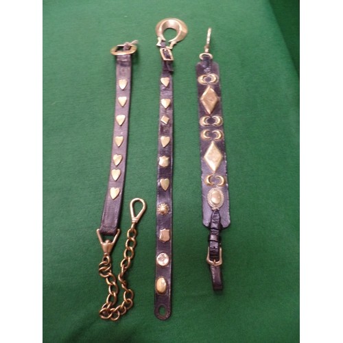 301 - THREE 19TH CENTURY HARNESS STRAPS WITH STUDS - HEARTS / MOONS / DIAMONDS / SHIELDS, ONE WITH CHAIN