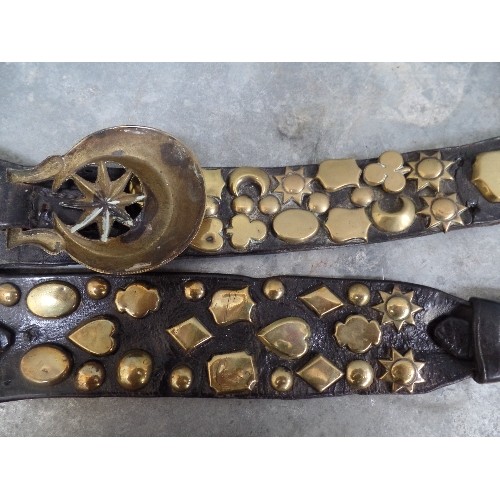 316 - THREE EARLY / MID 19TH CENTURY LEATHER HARNESS STRAPS PROFUSELY DECORATED WITH SMALL STUDS INCLUDING... 