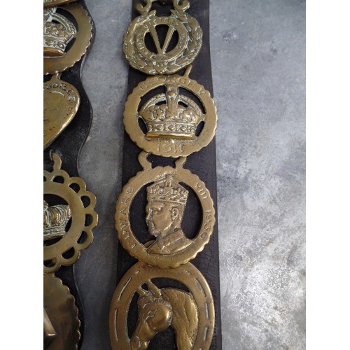 323 - TWO HARNESS STRAPS WITH ROYALTY AND COMMEMORATIVE BRASSES. INCLUDES QUEEN VICTORIA JUBILEE 1887, VER... 