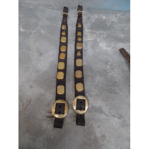 377 - FOUR ANTIQUE BRASS STUDDED HARNESS STRAPS INCLUDING A PAIR WITH OVAL BUCKLES, A SKILFULY MADE LONG S... 