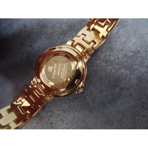 58 - OSKAR EMIL MONACO LADIES GOLD METAL WATCH IN BOX WITH PAPERWORK AND A H&M GENTS WATCH WITH STEEL STR... 