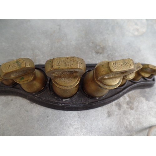 50 - A SET OF SALTERS BRASS WEIGHTS ON A STAND