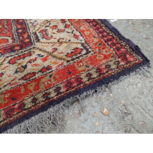 146A - ANTIQUE PERSIAN RUG, THE CENTRAL PANEL WITH TRADITIONAL BOTEH PATTERN AGAINST A DARK BLUE GROUND. 13... 