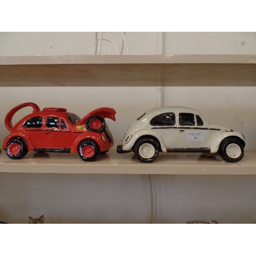 67 - A PAIR OF CERAMIC VW BEETLES. ONE IS COLNE VALLEY WORKSHOP MONEYBOX. [HAS DESIGN CENTRE-LONDON STICK... 