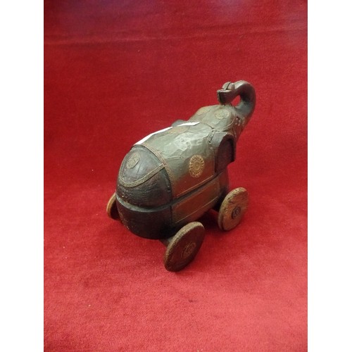 120 - REPRODUCTION CARVED ELEPHANT TRINKET BOX ON WHEELS WITH METAL DECORATION