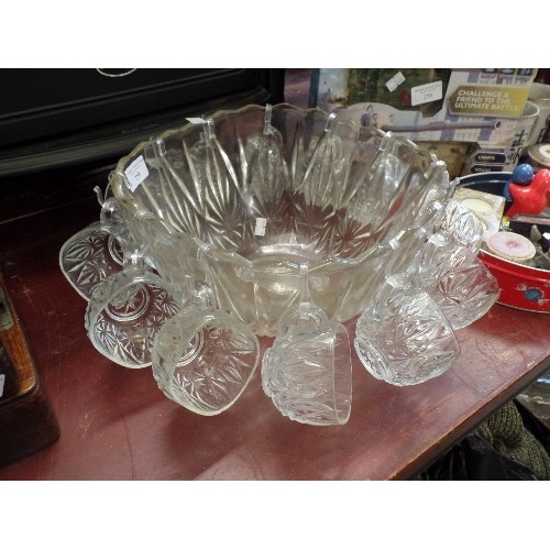 258 - RETRO-VINTAGE PUNCH BOWL SURROUNDED BY 12 GLASS HANGING PUNCH CUPS.