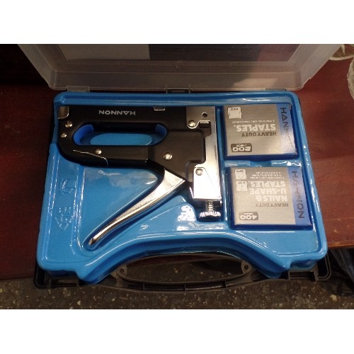 263 - HANNON HEAVY DUTY STAPLE GUN. APPEARS NEW IN CARY CASE, WITH STAPLES.