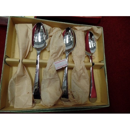 283 - 3 VINTAGE BOXED CUTLERY SETS. INCLUDES BUTTER KNIVES, TEASPOONS, AND SERVING SPOONS.