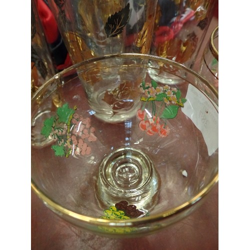 287 - SET OF RETRO GOLD-RIMMED DRINKING GLASSES, SUNDAE DISHES, AND A CUT-GLASS DECANTER WITH STOPPER.