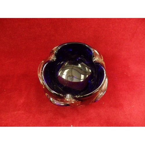 302 - 3 HEAVY INK BLUE VINTAGE GLASS ITEMS. INCLUDES A PAPERWEIGHT, AND 2 ASHTRAYS.