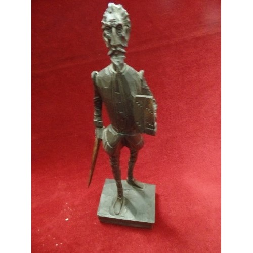 62 - BRONZE SPARTAN FIGURE AND A CARVED WOODEN FIGURE OF DON QUIXOTE