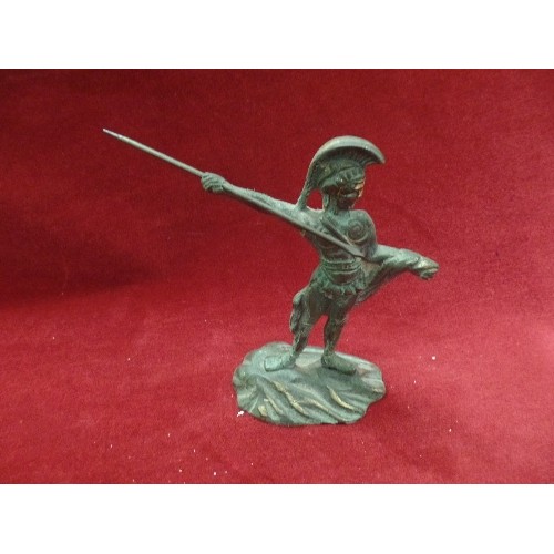 62 - BRONZE SPARTAN FIGURE AND A CARVED WOODEN FIGURE OF DON QUIXOTE