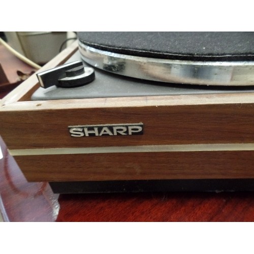 554 - SHARP STEREO MUSIC CENTRE AND A PAIR OF SANYO SPEAKERS