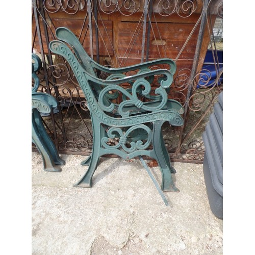 629 - PAIR OF CAST IRON GREEN BENCH ENDS