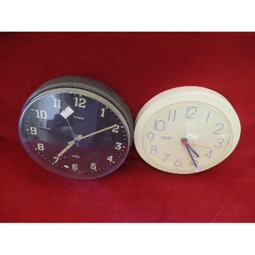 75 - 2 RETRO PLASTIC WALL CLOCKS, IN CREAM AND BROWN. A METAMEC AND A WESTCLOX.