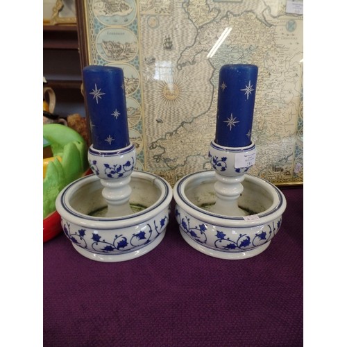 111 - PAIR OF LARGE BLUE & WHITE CERAMIC CANDLESTICKS. INCLUDES 2 X BLUE CANDLES.