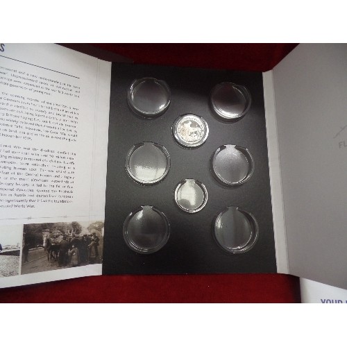 184 - COMMEMORATIVE COIN FOLDERS. 5 FOLDERS CONTAINING 1 COIN EACH. REMAINING COINS WERE NEVER PURCHASED? ... 