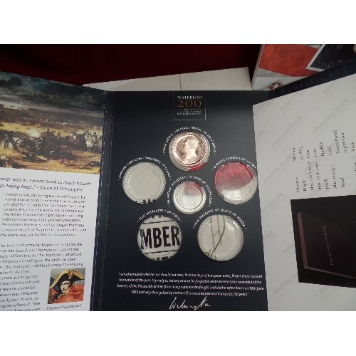 184 - COMMEMORATIVE COIN FOLDERS. 5 FOLDERS CONTAINING 1 COIN EACH. REMAINING COINS WERE NEVER PURCHASED? ... 