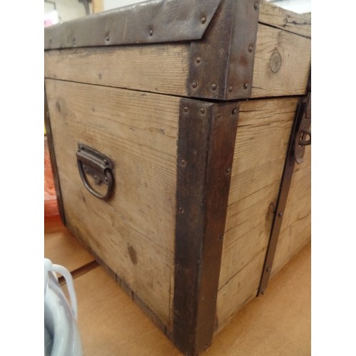 247 - VINTAGE RUSTIC WOODEN CHEST, WITH HEAVY IRON BANDS, HANDLES AND EDGES.