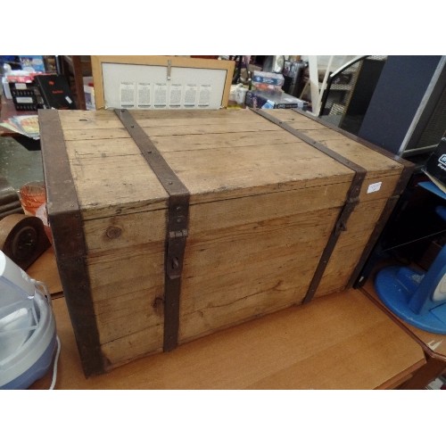 247 - VINTAGE RUSTIC WOODEN CHEST, WITH HEAVY IRON BANDS, HANDLES AND EDGES.