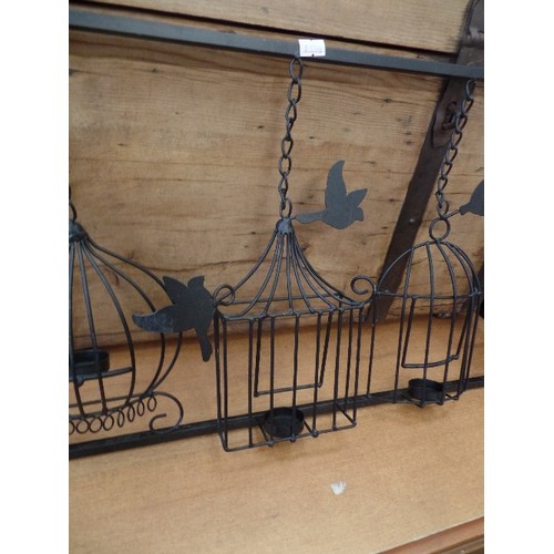 249 - LARGE POWDER-COATED METAL TEA-LIGHT HOLDER WALL FEATURE. DECORATED WITH 4 BIRDCAGES & BIRDS.