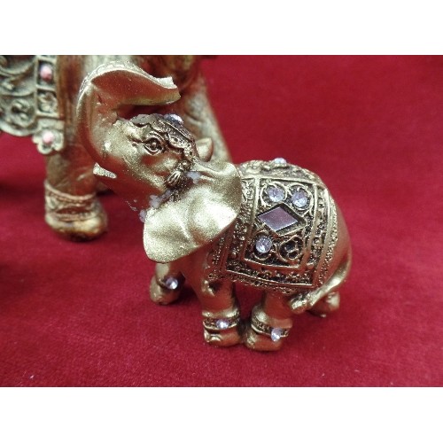 270 - 4 DECORATIVE INDIAN ELEPHANTS. 2 ARE ORNATE WITH BRASSED FINISH.