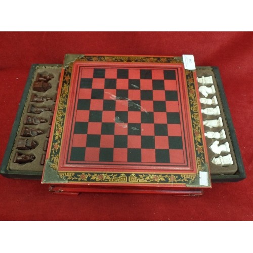 294 - SMALL CHESS SET, DECORATIVE WOODEN BOX, WITH 2 PULL-OUT DRAWERS CONTAINING PIECES.