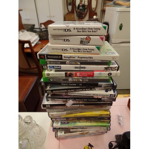 309 - STACK OF X-BOX AND PLAYSTATION GAMES. INC WARHAMMER, FIFA, NINTENDO DS BRAINTRAINING ETC.