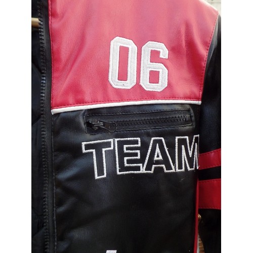 353 - SMALL REBEL-PRO RACE-TEAM BIKER JACKET. AGE 9-10 YEARS. FAUX LEATHER. BLACK WITH RED & WHITE.