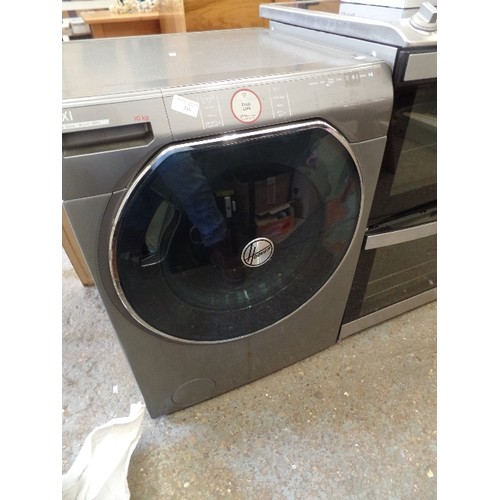 299 - HOOVER AXI TOTAL CARE WASHING MACHINE. IN METALLIC GREY.