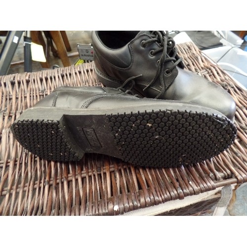 404 - LIDDED WICKER LAUNDRY BASKET, CONTAINING MENS SHOES & BOOTS. SIZE 11. APPEAR LITTLE WEAR.