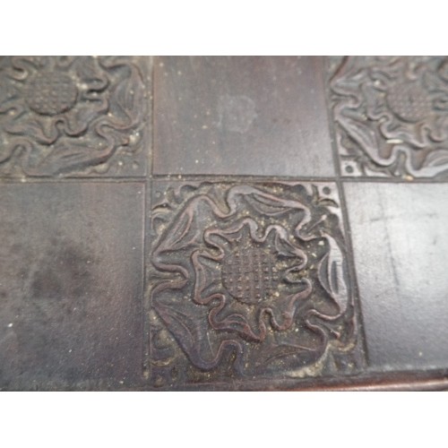 411 - LARGE CARVED WOODEN CHESS BOARD, WITH TUDOR-ROSE DETAIL, WITH BAIZE BACKING.