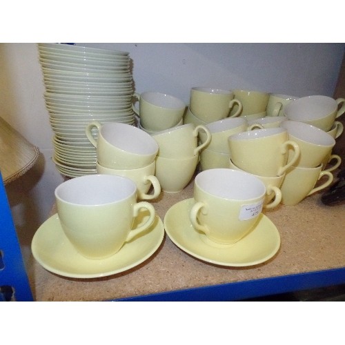 473 - YELLOW CUPS AND SAUCERS APPROX  30