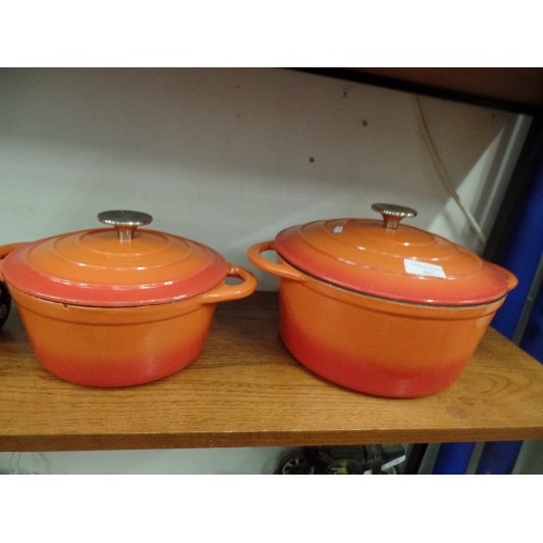 463 - 2 CAST IRON ORANGE CASSEROLE DISHES  WIH LIDS BY COOKS