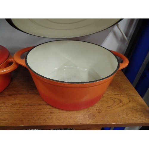 463 - 2 CAST IRON ORANGE CASSEROLE DISHES  WIH LIDS BY COOKS