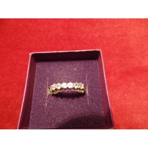 41 - A 9CT WHITE GOLD HALF ETERNITY RING SET WITH 7 PALE BLUE GREY TANZANITES, SIZE Q, 2.5 GRAMS