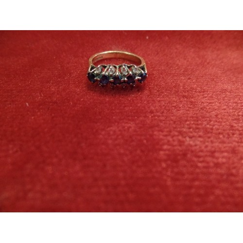 43 - 18CT GOLD DRESS RING SET WITH 5 ROUND CUT SAPPHIRES FLANKED BY 8 DIAMONDS - 3.6 GRAMS