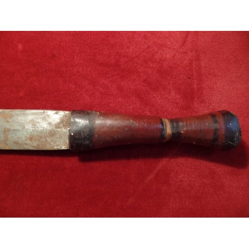 97 - A CIRCA 1930'S NIGERIAN ARM DAGGER WITH LEATHER COVERED HILT AND SCABBARD. PLAITED, TOOLED AND PAINT... 